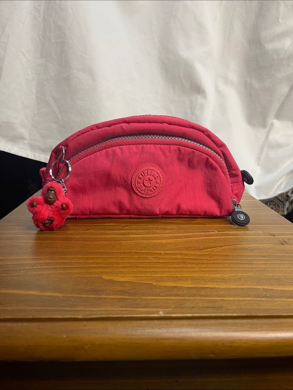 Kipling Pink Semi-Circle Cosmetic Pouch with Monkey Charm